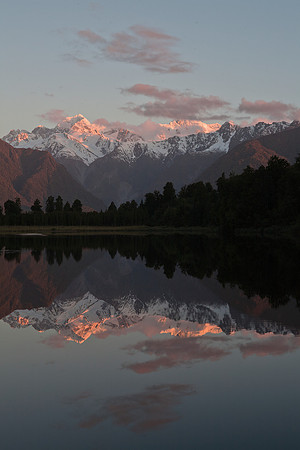 Reflective sunset view across Lake Matheson 2