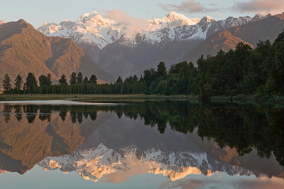 Reflective sunset view across Lake Matheson 1